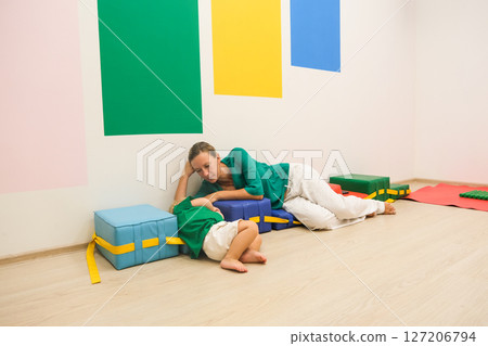 child and mom in kindergarten gym child and mom in kindergarten gym 127206794