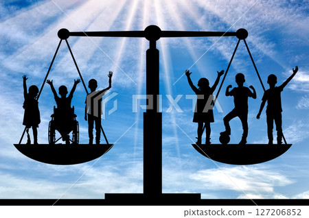 Silhouettes of Diverse Children on a Scale of Justice 127206852