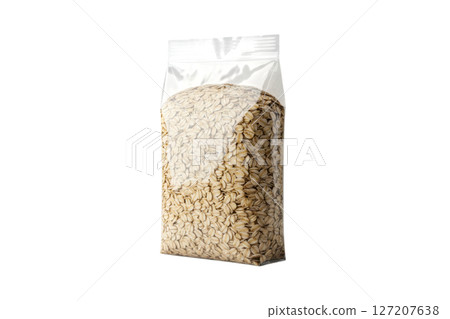 Clear plastic bag filled with dry rolled oats for healthy breakfast cereal Clear plastic bag filled with dry rolled oats for healthy breakfast cereal 127207638