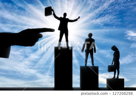 Silhouette of a finger points to the silhouette of a jubilant man, next to an upset man and woman. Hiring concept. 127208298