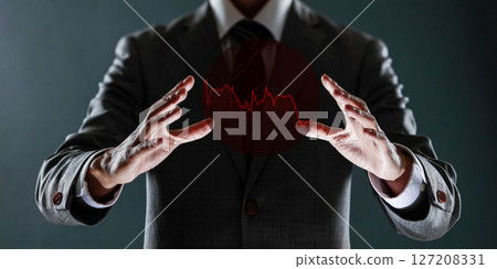 businessman with financial symbols coming from hand, stock markets concept. 127208331
