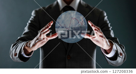 businessman with financial symbols coming from hand, stock markets concept. 127208336