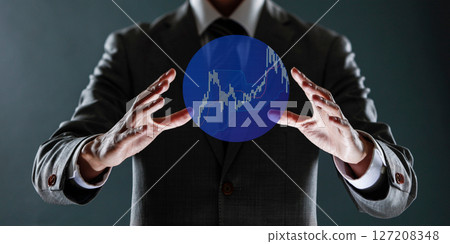 businessman with financial symbols coming from hand, stock markets concept. 127208348
