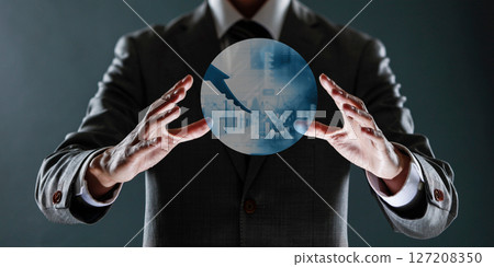 businessman with financial symbols coming from hand, stock markets concept. 127208350