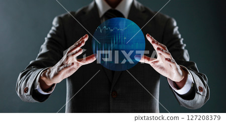businessman with financial symbols coming from hand, stock markets concept. 127208379