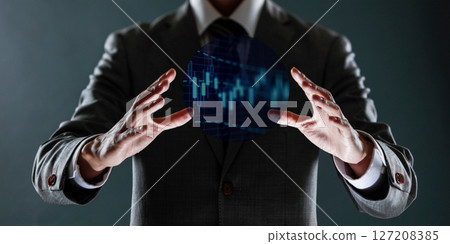 businessman with financial symbols coming from hand, stock markets concept. 127208385