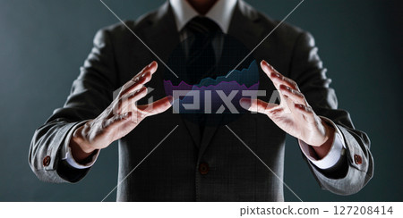 businessman with financial symbols coming from hand, stock markets concept. businessman with financial symbols coming from hand, stock markets concept. 127208414