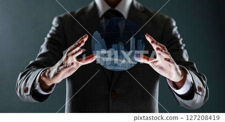 businessman with financial symbols coming from hand, stock markets concept. businessman with financial symbols coming from hand, stock markets concept. 127208419