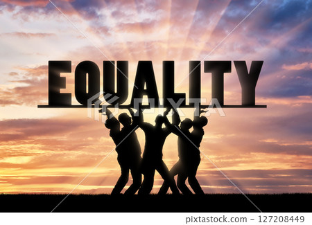 A group of people hold the word equality over them 127208449