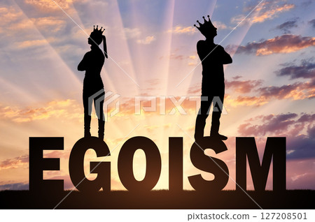 Selfish and narcissistic man and woman standing on the word selfishness turned away from each other 127208501