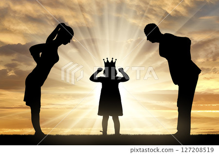 Childish selfishness. Dissatisfied parents Dad and Mom condemningly look at the selfish child girl with a crown. Childish selfishness. Dissatisfied parents Dad and Mom condemningly look at the selfish child girl with a crown. 127208519