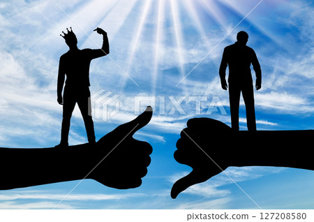 Selfishness and ego. An arrogant selfish man with a crown on his head, considering himself better than the other person. Selfishness and ego. An arrogant selfish man with a crown on his head, considering himself better than the other person. 127208580