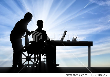 Empowering Disabled Person Working at Desk Against Sky 127208647