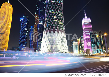 Night road traffic in financial centre in Doha, Qatar Night road traffic in financial centre in Doha, Qatar 127210763