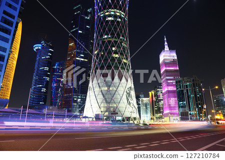 Night road traffic in financial centre in Doha, Qatar Night road traffic in financial centre in Doha, Qatar 127210784