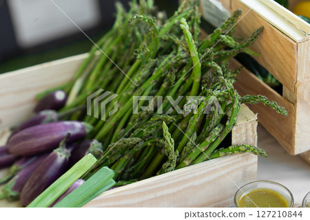 Fresh vegetables sparrowgrass and verrines on a catering table for a wedding or birthday Fresh vegetables sparrowgrass and verrines on a catering table for a wedding or birthday 127210844