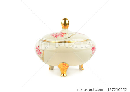 Porcelain vintage sugar bowl isolated on white. Porcelain vintage sugar bowl isolated on white. 127210952
