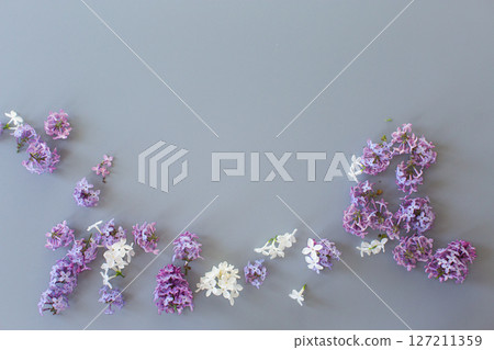Romantic lilac bouquet on gray background Romantic lilac bouquet on gray background 127211359