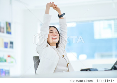 Woman taking a deep breath indoors 127211617