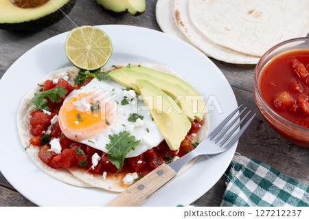 Huevos Rancheros. Traditional Mexican breakfast 127212237