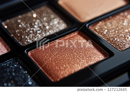 Brown eyeshadow palette shimmer metallic close up view 127212685