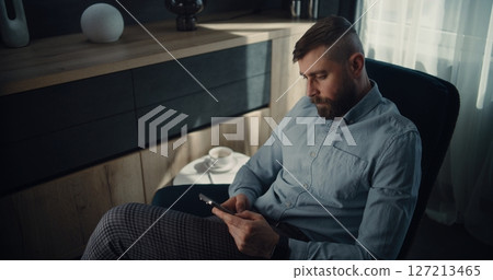 Stock Exchange Trader Monitoring Real-Time Stocks Using Smartphone, Making Trading Deal 127213465