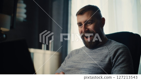 Stock Exchange Broker Happy About Successful Trading Deal, Having Call, Working on Laptop 127213543