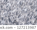 Bubble wrap macro photo with selective focus. 127213987