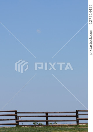 Ranch fence and blue sky (for copy space) vertical photo Ranch fence and blue sky (for copy space) vertical photo 127214433