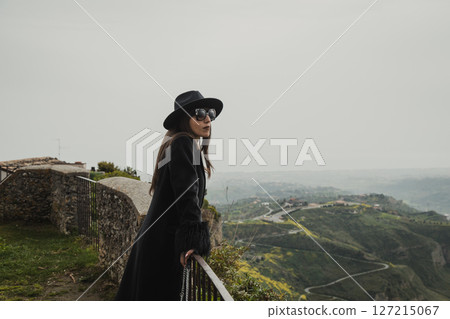 Natural Scenery In Front Of A Woman Watching From The Town Highest Point 127215067