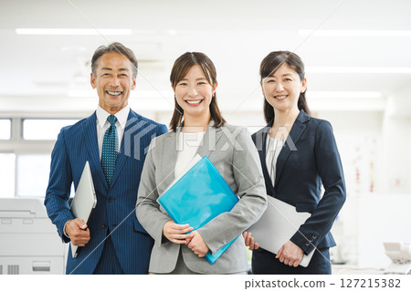 Portrait of a business person working in the office 127215382