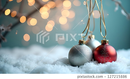 Enchanting Christmas Ornaments Gleaming on a Snowy Surface Against Festive Lights Enchanting Christmas Ornaments Gleaming on a Snowy Surface Against Festive Lights 127215886