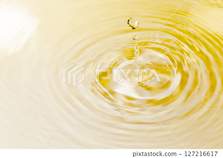Drops of water falling on the surface of the water. 127216617
