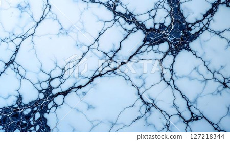 Marble surface featuring elegant blue and white veining, showcasing a sophisticated and modern aesthetic 127218344