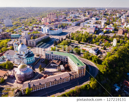Panoramic aerial view of city of Kursk with buildings and landscape 127219131