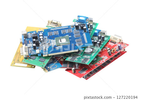 Colorful Circuit Boards Piled Together isolated on white background and have clipping paths. 127220194