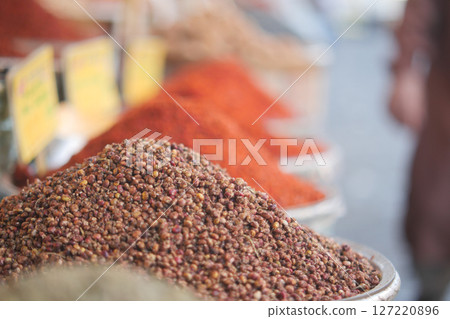 Vibrant and Colorful Spices Beautifully Displayed in Market Baskets 127220896