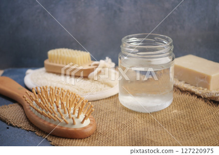 Natural Hair Care Essentials Include Brush, Soap, and Water for Healthy Hair Natural Hair Care Essentials Include Brush, Soap, and Water for Healthy Hair 127220975