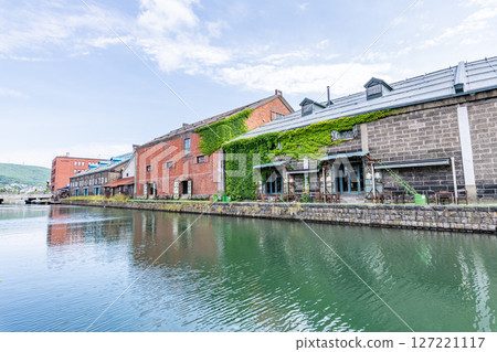 Otaru City, Hokkaido - One of Hokkaido's most popular tourist destinations - Otaru Canal and warehouses in early summer 127221117