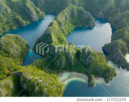 Tropical Lakes surrounded by splendid limestone rocks. Kayangan Lake. Barracuda Lake. Coron, Palawan. Philippines. 127222220