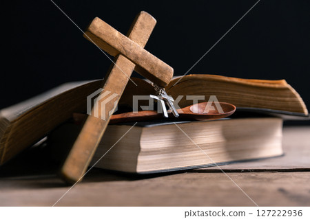 Religious belief concept Close up prayer Christian church service Bible Holy cross Spiritual power Blurred background Desk copy space Heaven God Catholic faith Praise book Jesus worship Gospel symbols Religious belief concept Close up prayer Christian church service Bible Holy cross Spiritual power Blurred background Desk copy space Heaven God Catholic faith Praise book Jesus worship Gospel symbols 127222936