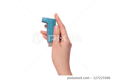 Hand with blue asthma inhaler, isolated on white background Hand with blue asthma inhaler, isolated on white background 127225986