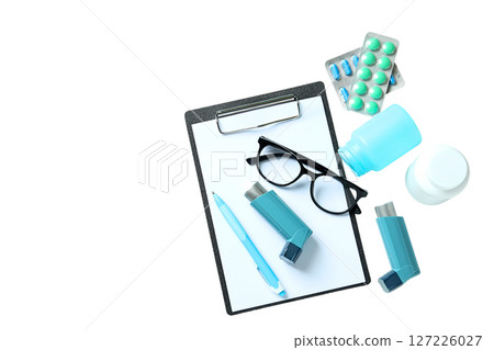 Organized medical supplies and docs, isolated on white background 127226027