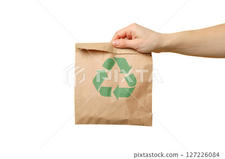 Hand with a brown paper bag and recycling symbol, isolated on white 127226084