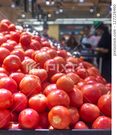 Fresh tomatoes in the supermarket 127226460