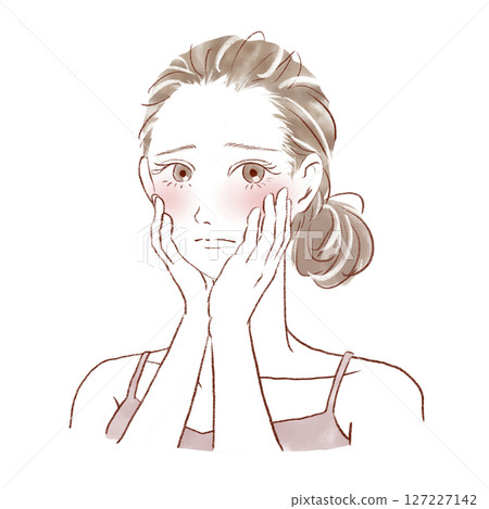 A beautiful woman with both hands on her cheeks looking at the camera with a sad expression 127227142