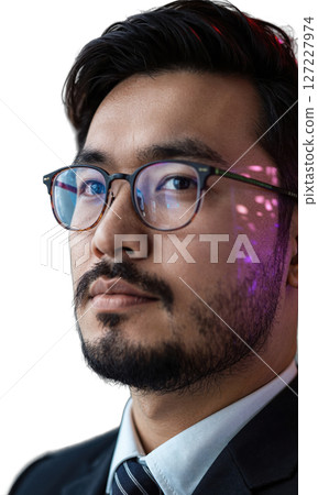 An Asian man with a neat beard and slim glasses, his focused, thoughtful expression framed by digital patterns, representing clarity An Asian man with a neat beard and slim glasses, his focused, thoughtful expression framed by digital patterns, representing clarity 127227974