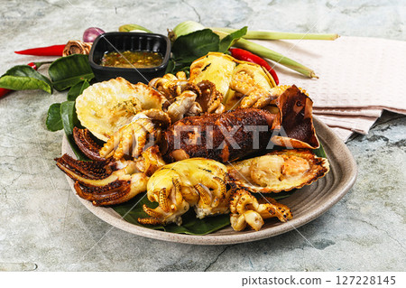 Asian grilled seafood mix plate Asian grilled seafood mix plate 127228145