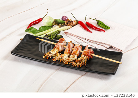 Thai Street foof satay with bacon and mushroom Thai Street foof satay with bacon and mushroom 127228146