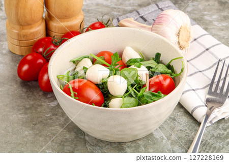 Salad with mozzarella and arugula Salad with mozzarella and arugula 127228169